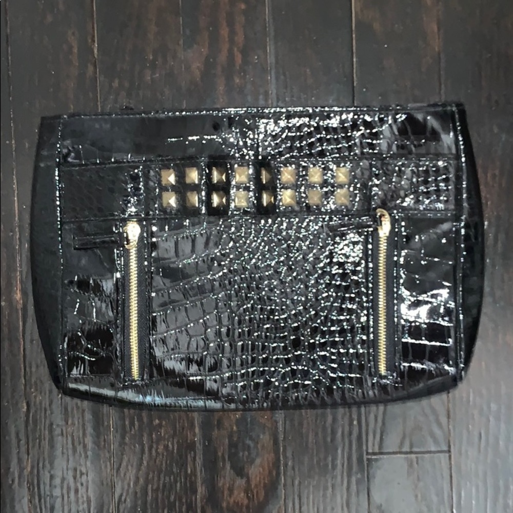 Rihanna studded black croc wrist sleeve clutch